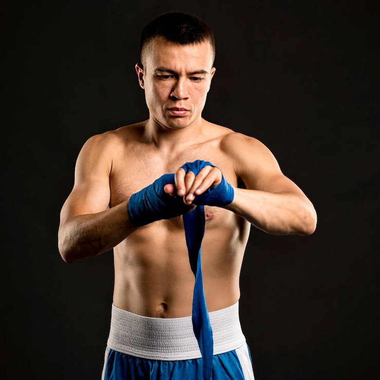front-view-male-boxer-putting-protection-hands_23-2148615015 - Copy